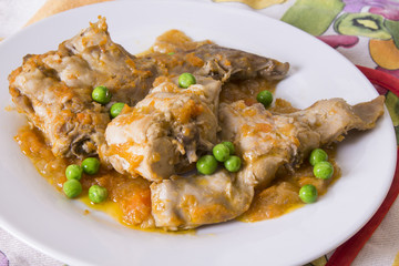 stew of rabbit with carrot and peas