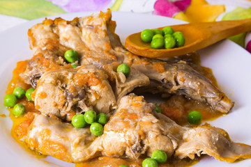 stew of rabbit with carrot and peas