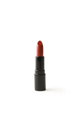 single tube of red lipstick isolated on white
