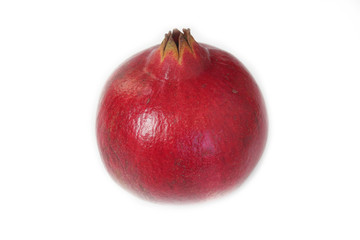 Ripe pomegranate fruit isolated on white background