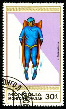 Ukraine - circa 2018: A postage stamp printed in Mongolia shows drawing Sledge. Series: Winter sports. Circa 1989.
