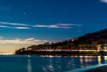 Night view of coast of Garda lake 