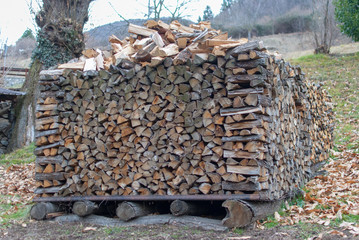 Woodpile in a characteristic mountain village 