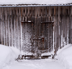 Frosty barn door in winter 