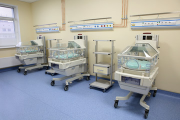 Closeup of infant incubator technology in a medical center hospital 