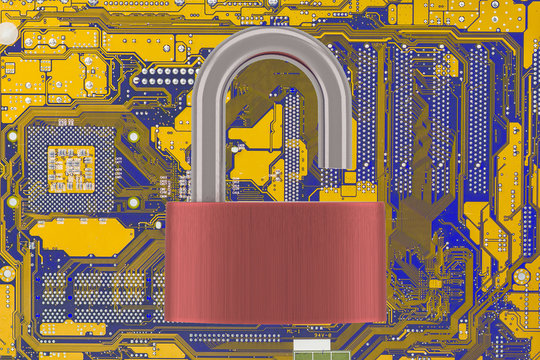 Computer Motherboard With Unlocked Padlock On Light Background. Vulnarable To Attack  Concept.