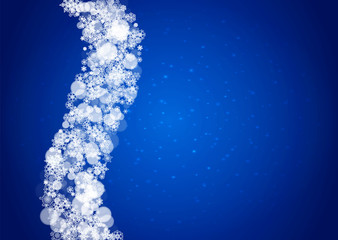 Snowflakes falling on blue background with sparkles. Christmas and New Year horizontal theme. Frosty falling snowflakes for banners, gift card, party invitation, compliments and special business offer