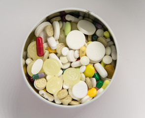 Beautiful colorful jewelry making beeds on white background. Shallow depth of field. Hand craft supplies.