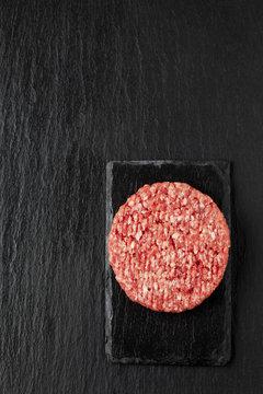 Raw beef patty