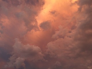 Sunset behind clouds