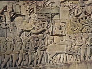 Fototapeta na wymiar Architecture Bas-relief wall carving of Prasat Bayon temple at Angkor Wat 