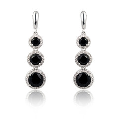 Pair of spinel diamond earrings isolated on white