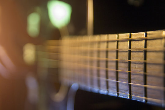 Guitar close up, blur lights