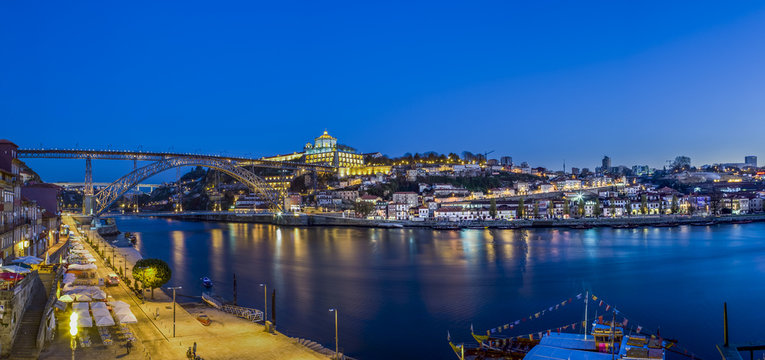 Portugal, Porto, Luiz I Bridge and Douro river, Mosteiro da Serra do Pilar in background in the evening