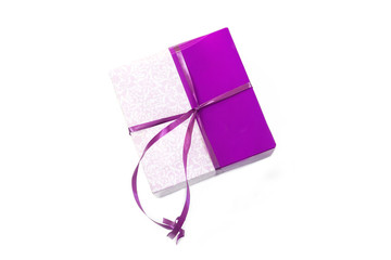 Gift box, parcel in wrapping paper tied with purple color ribbon, packaging mock up