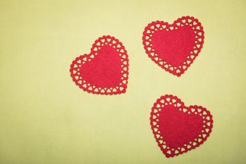 Obraz premium red box for jewelry with a heart inside on a yellow background