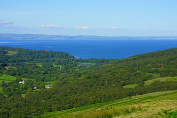 Fototapeta premium Scottish landscape with green rolling hills in the Isle of Arran, Scotland