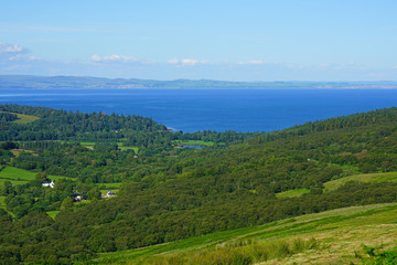 Scottish landscape with green rolling hills in the Isle of Arran, Scotland