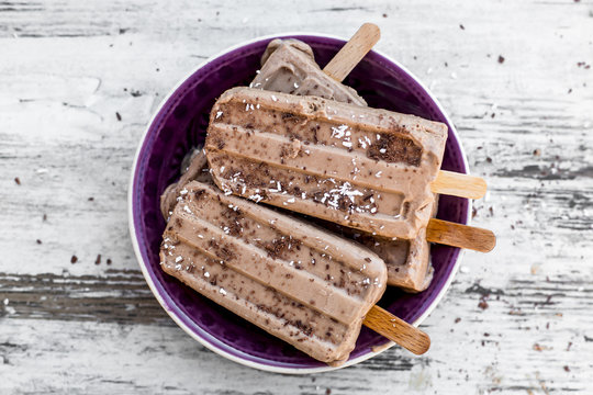 Homemade chocolate yogurt popsicles
