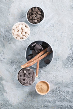 Bowls of licorice roots and different licorice products