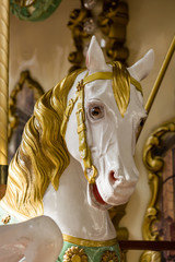 City colorful traditional french carousel for children, horse for riding