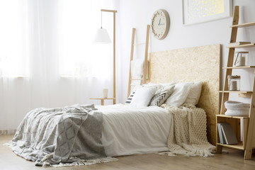 Side angle of white bed - obrazy, fototapety, plakaty