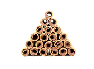 rolled wafer filled with chocolate fudge on white background