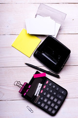 Business idea concept. Stationery and calculator.