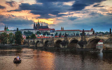 View of Prague Castle and Charles Bridge at sunset. Czechia