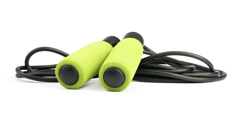 Green jump rope or skipping rope isolated on white background. Sports, fitness, cardio, martial art and boxing accessories.