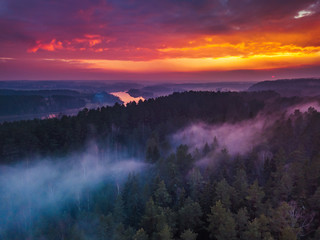 Aerial sunrise or sunset with colorful fog and river