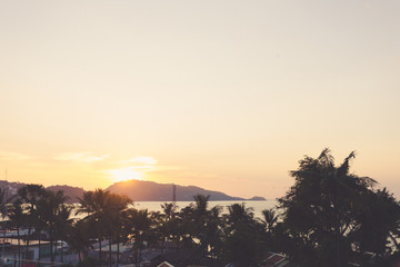 beach viewpoint of Patong with sunset looking out from rooftop