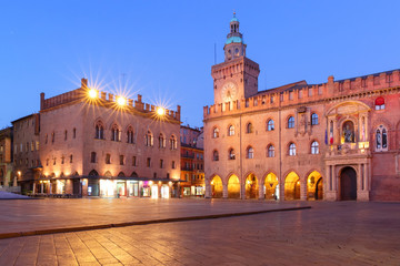 Fototapeta na wymiar Piazza Maggiore square with Palazzo dei Notai and Palazzo d'Accursio or Palazzo Comunale at night, Bologna, Emilia-Romagna, Italy