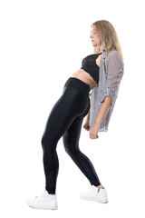Fototapeta premium Flexible attractive jazz dance woman doing dancing aerobics exercise and bending backwards. Full body length portrait isolated on white background. 