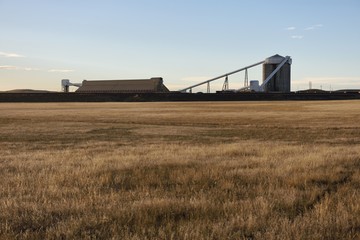 Coal silos and coal train loading and processing facilities in the Powder River Basin, Wyoming.
