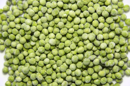 Frozen green peas food background