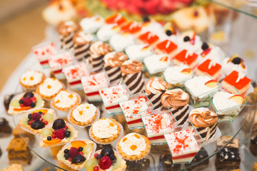 Different kinds of baked sweets on a buffet