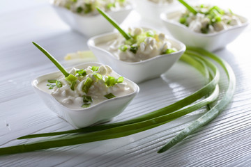 Cottage cheese with green onions.