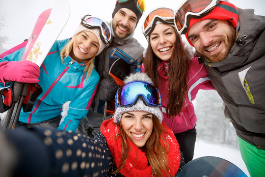 Cheerful friends at skiing