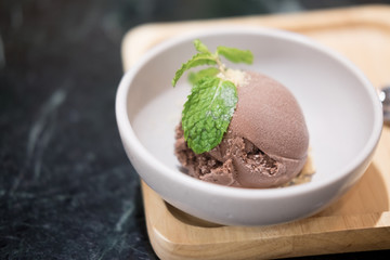 Sweet chocolate ice cream in bowl