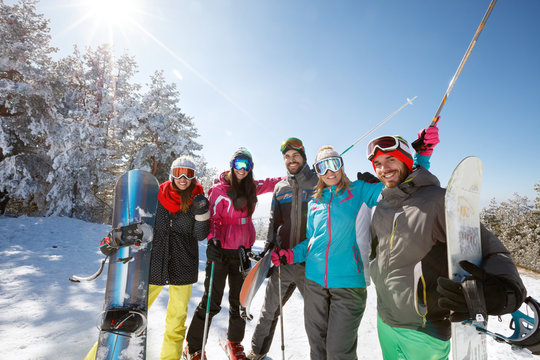 Skiers group together on snow