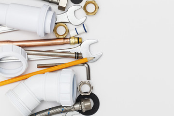 Plumbing tools and equipment overhead view.