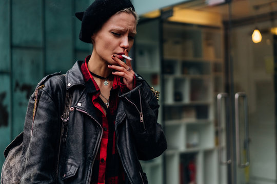 Beautiful Rock Rebel Girl Walking on the Streets.
