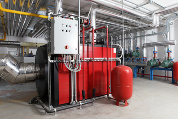 central heating and cooling system control in a boiler room