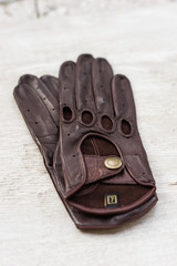 brown driving gloves