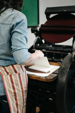 Letterpress artist in her studio