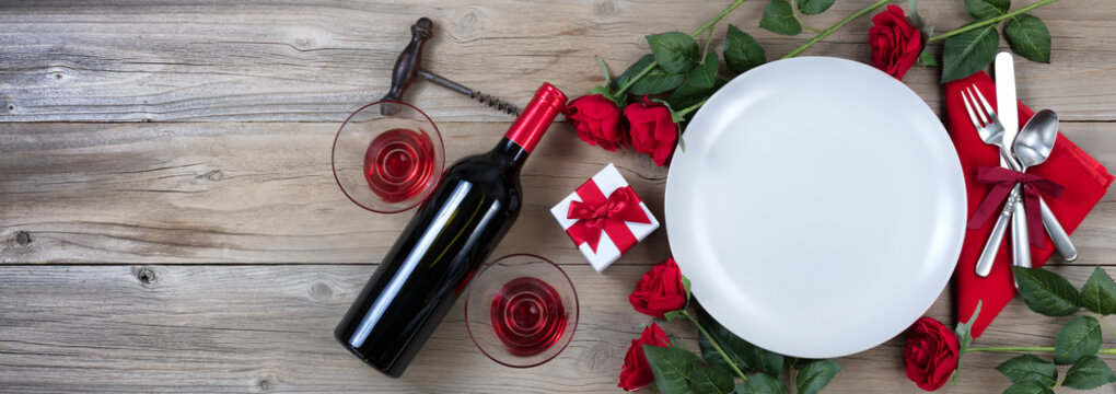 Valentines Dinner with Red Wine on rustic wooden background