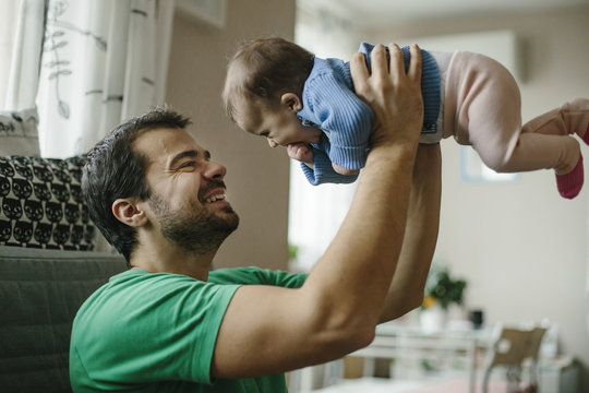 Young Father With His Baby