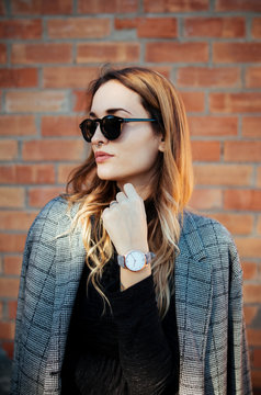 Portrait of stylish woman with coat