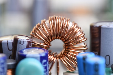 Electromagnetic coil, inductor on circuit board close-up